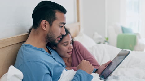 Love,-tablet-and-couple-cuddle-in-bed-for-bonding