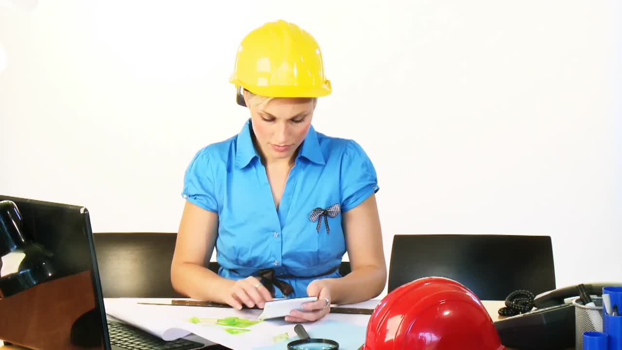 Female architect working in office footage