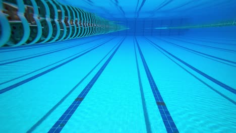 olympic swimming pool under water background.