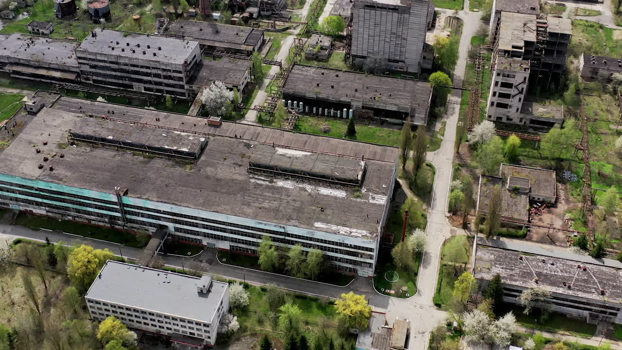 Aerial shot of big abandoned factory. aerial view of ruined old factory.