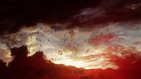 High-flying-flock-of-birds-circling-over-desert-mountain-landscape,-deep-rusty-red-sunset-clouds-time-lapse