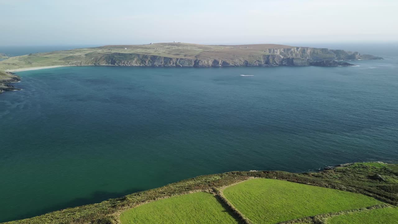 West Cork green Mizen Head fields and turquoise Atlantic water at Barleycove beach from above