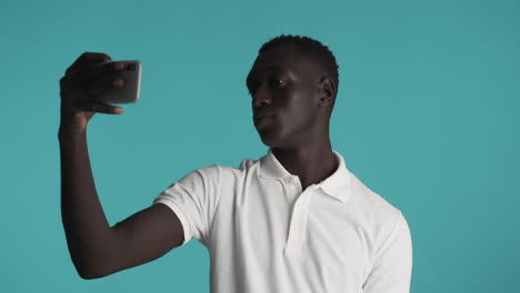 african american man on blue background.