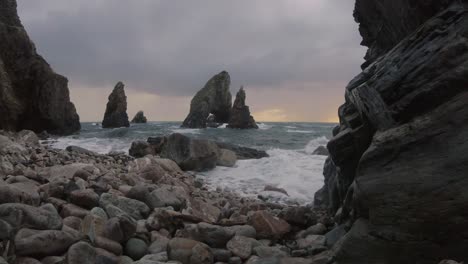 crohy head in donegal ireland ocean wave on rocks in sunset