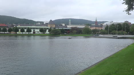 big fountain in the center of a lake