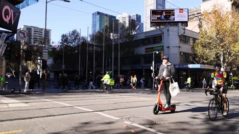 tram, cyclists, and pedestrians on a melbourne street