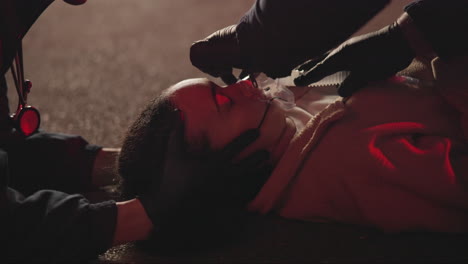 Paramedic,-woman-and-oxygen-mask-in-road