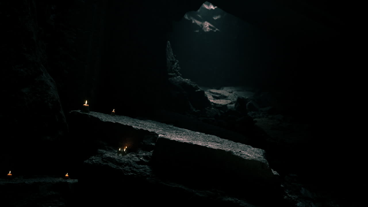 Mysterious underground cave illuminated by flickering candles at night