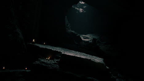 mysterious underground cave illuminated by flickering candles at night