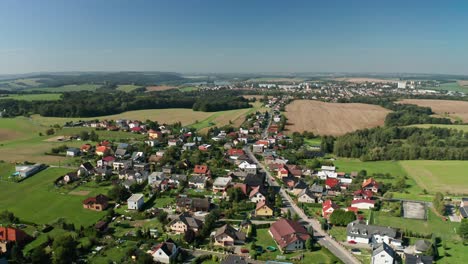 aerial drone shot of czech small village on sunny day