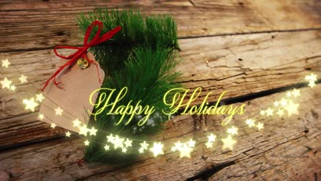 Animation-of-happy-holidays-text-over-christmas-tree-decorations