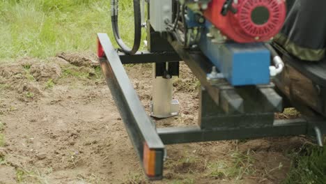 soil examination of agronomy. geotechnical investigation. collecting black soil on the field for examination and analysis. special equipment for pickup