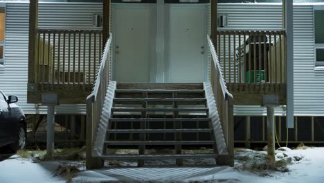 snow covered stair case in quiet neighbourhood