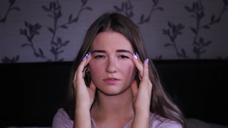 beautiful teenage girl having a headache