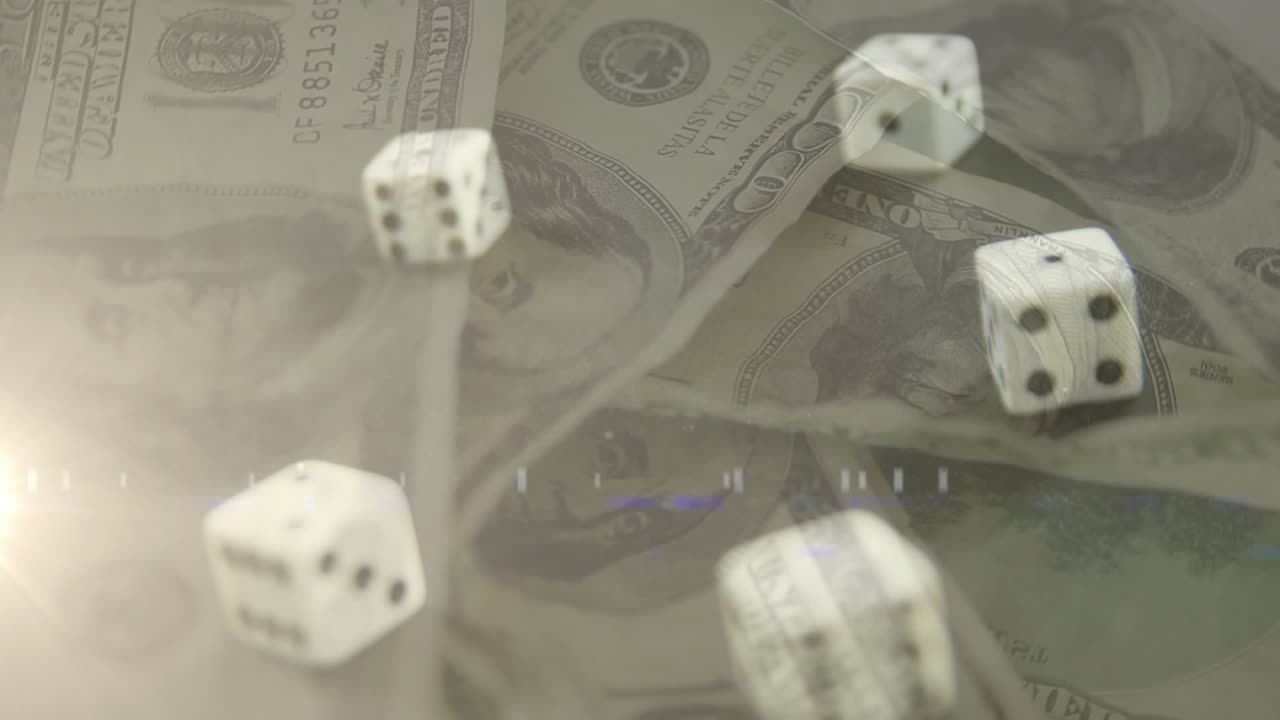Animation af terninger faldende over roterende amerikanske dollar sedler i baggrunden