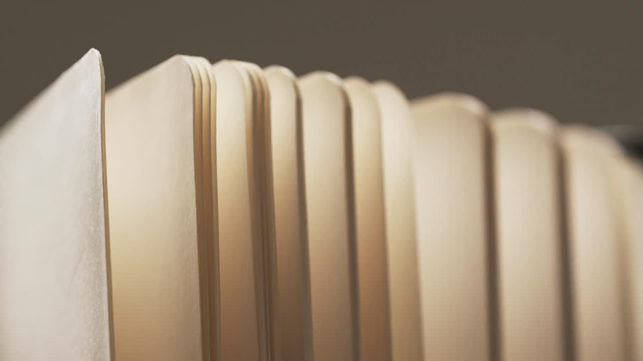 Micro of book pages and copy space on grey background