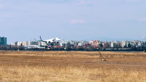 a plane lands at an airport