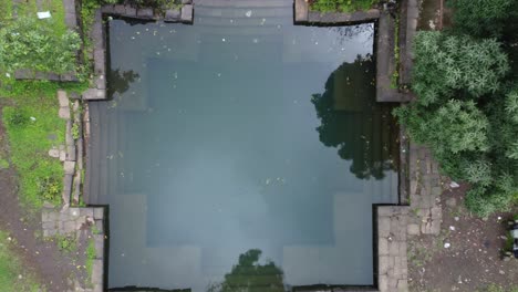 Drone-shot-of-spiritual-stepwell-in-Maharashtra,-India