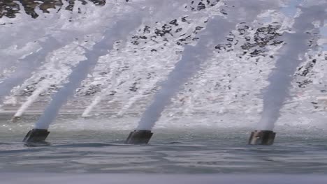 close-up of a fountain with water spraying from multiple jets