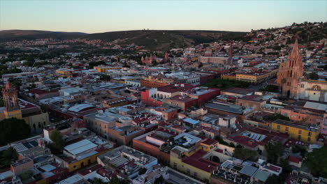 drone flying over a rich city in culture and languages