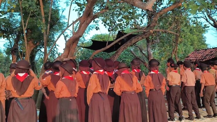 Indonesian Scouts Standing in Formation During Outdoor Activity