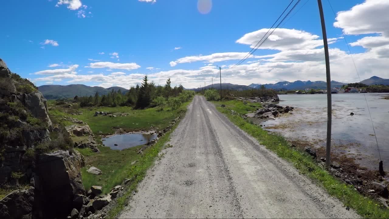 Driving a Car on a Road in Norway