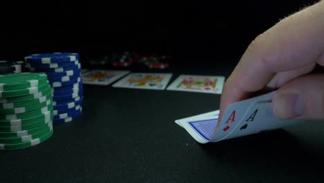 poker hand showing two aces