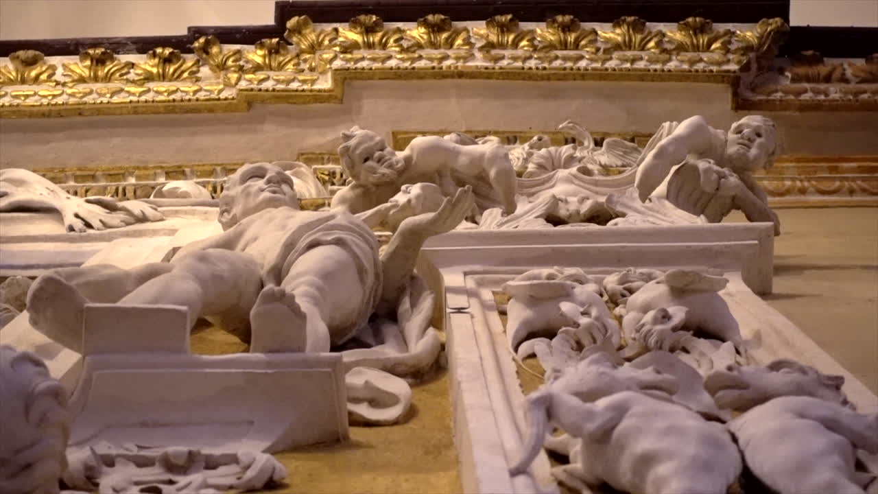 Stuccoes and statues inside the Serpotta Chapel of Castelbuono Castle, Sicily. Angels, devils, and fierce demonic faces decorate this masterpiece, showcasing Baroque artistry at its finest.