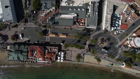 birds-eye top down aerial view of beachfront in avalon catalina island 4k drone footage