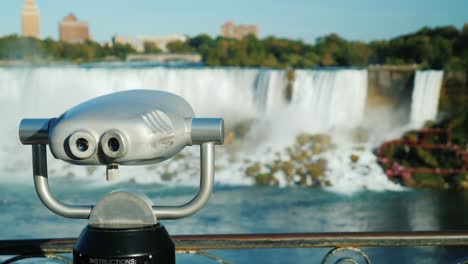 with a coin operated binoculars overlooking the niagara falls