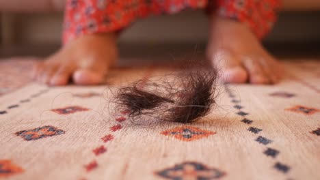 fallen hair on carpet