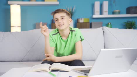 Young-boy-in-cute-thoughts-at-home.