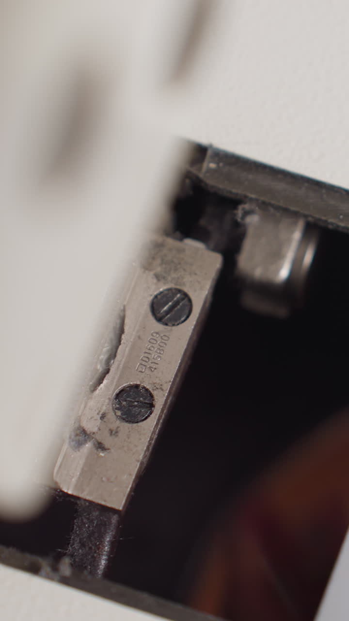 Electrician checks wires in panel, Closeup view of electrical switch inspection, Close inspection of electrical components highlighting maintenance work and detailed wire connections