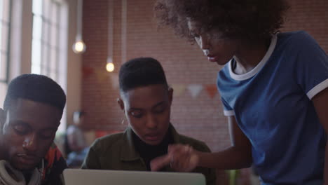 professional-black-business-people-meeting-team-leader-woman-training-colleagues-sharing-ideas-on-laptop-computer-brainstorming-in-modern-office-workplace