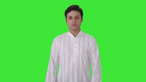 Serious-Indian-man-staring-in-traditional-outfit-Green-screen