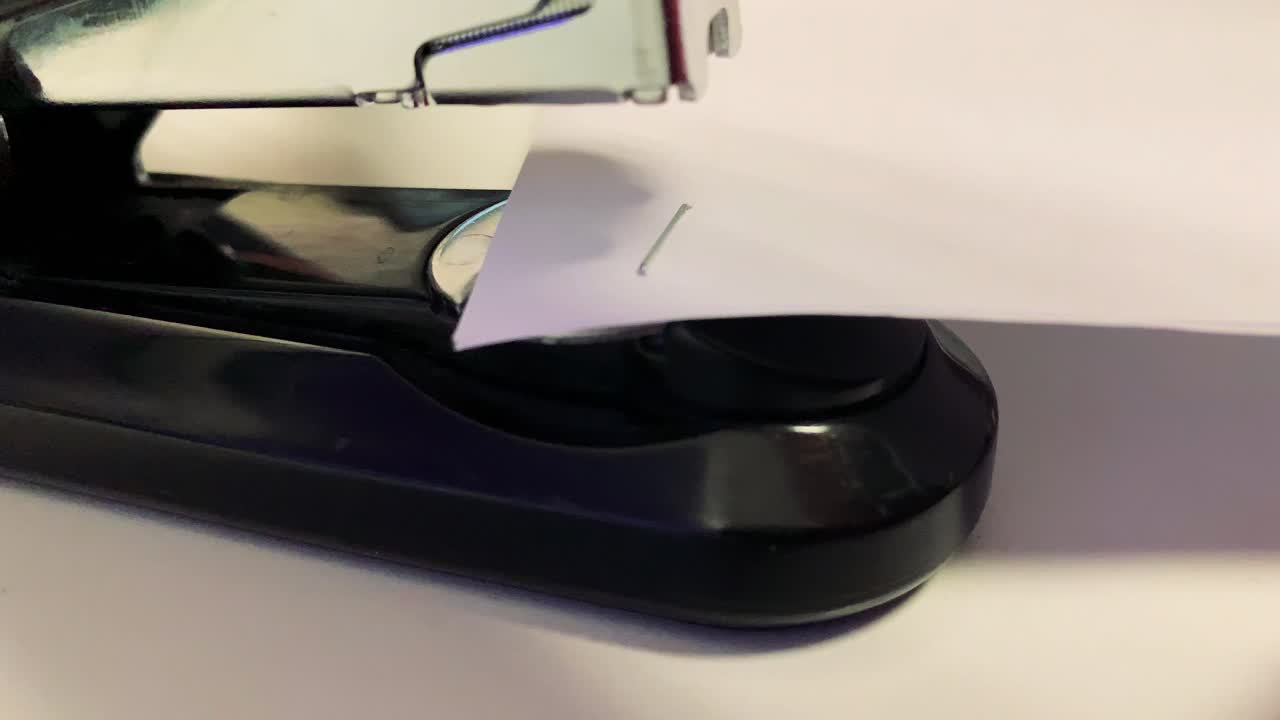 Stapler stapling papers together