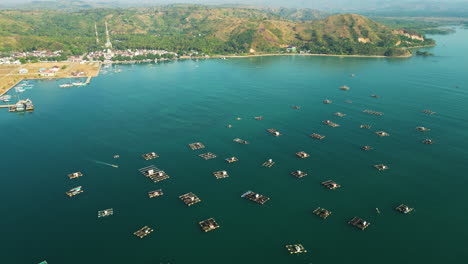 Lombok-island-fisherman-village-aerial-footage-of-traditional-fisherman-wooden-boat-in-open-ocean-water