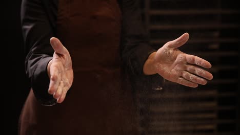 chef preparing dough with flour