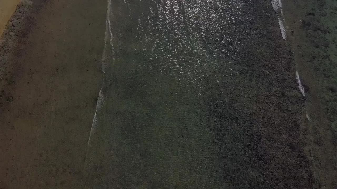 Crystal clear water sun reflected like diamonds