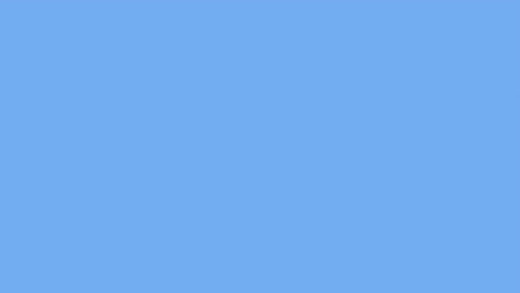 animación de unicornio y globos de colores flotando sobre un fondo azul