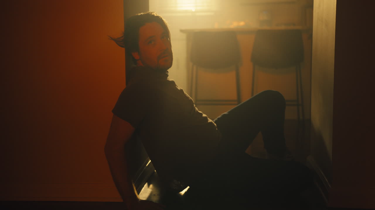 Man struggles to stand in dreamlike state