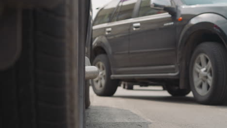 Vehicles-stand-on-street-with-traffic-jam-in-center-of-city