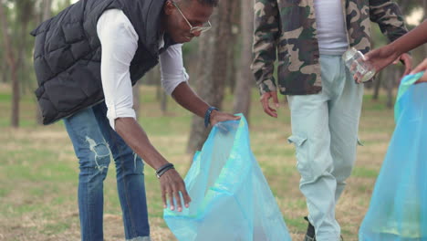volunteers cleaning up a park or forest