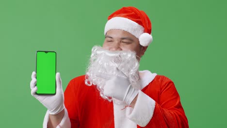 santa claus with green screen smartphone