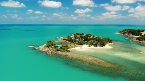 flight over a small island near choeng moe beach in koh samui, thailand, with a drone