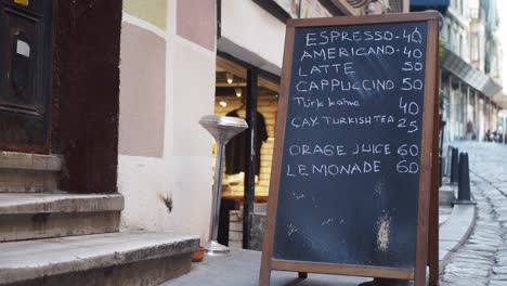 cafe menu board in a european city street