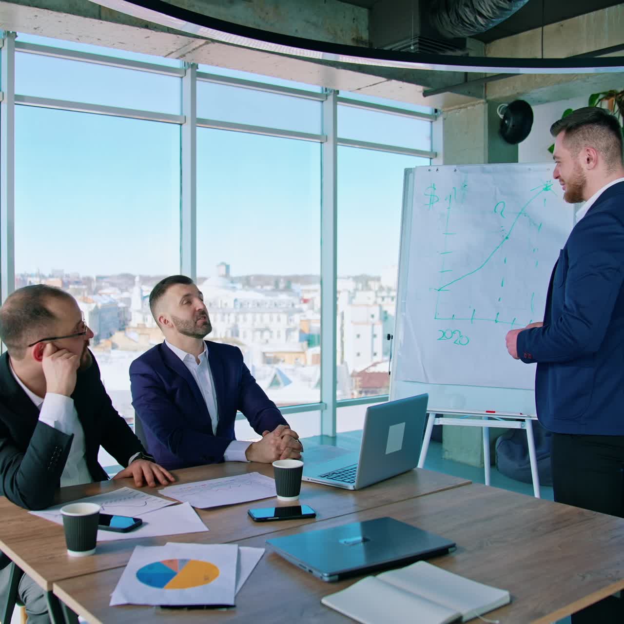 Business team discussing new business project together in office. Business meeting