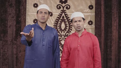 Two-muslim-men-showing-anger-and-frustration-to-the-camera