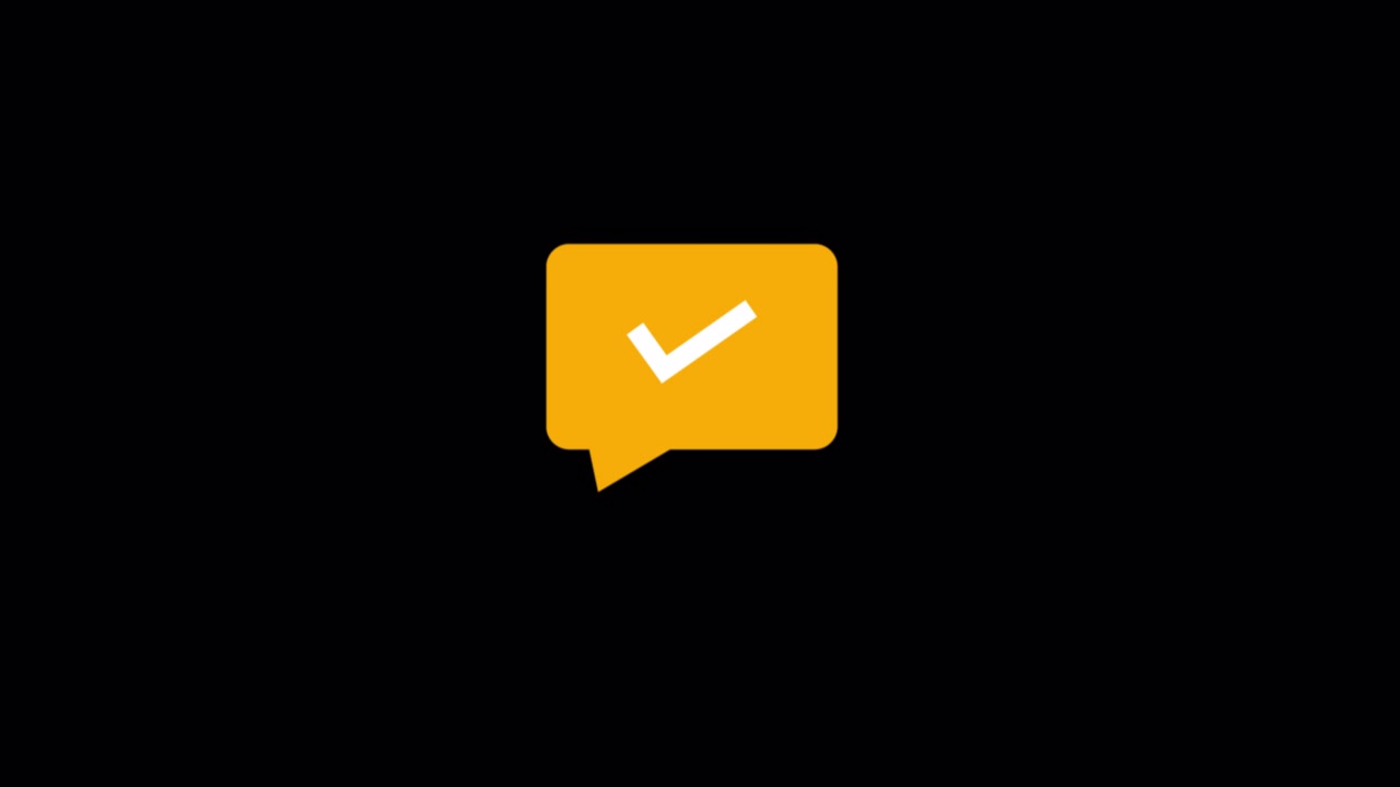 Yellow Speech Bubble with White Checkmark Icon on Black Background