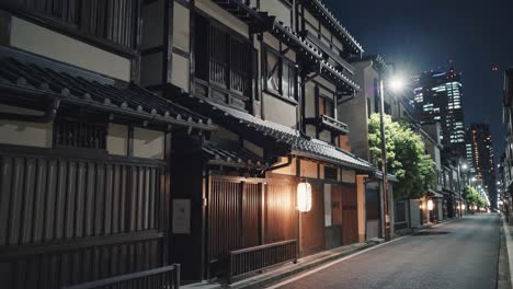blending traditional japanese architecture with modern city life, a captivating night scene in kyoto highlights illuminated lanterns against contemporary skyscrapers